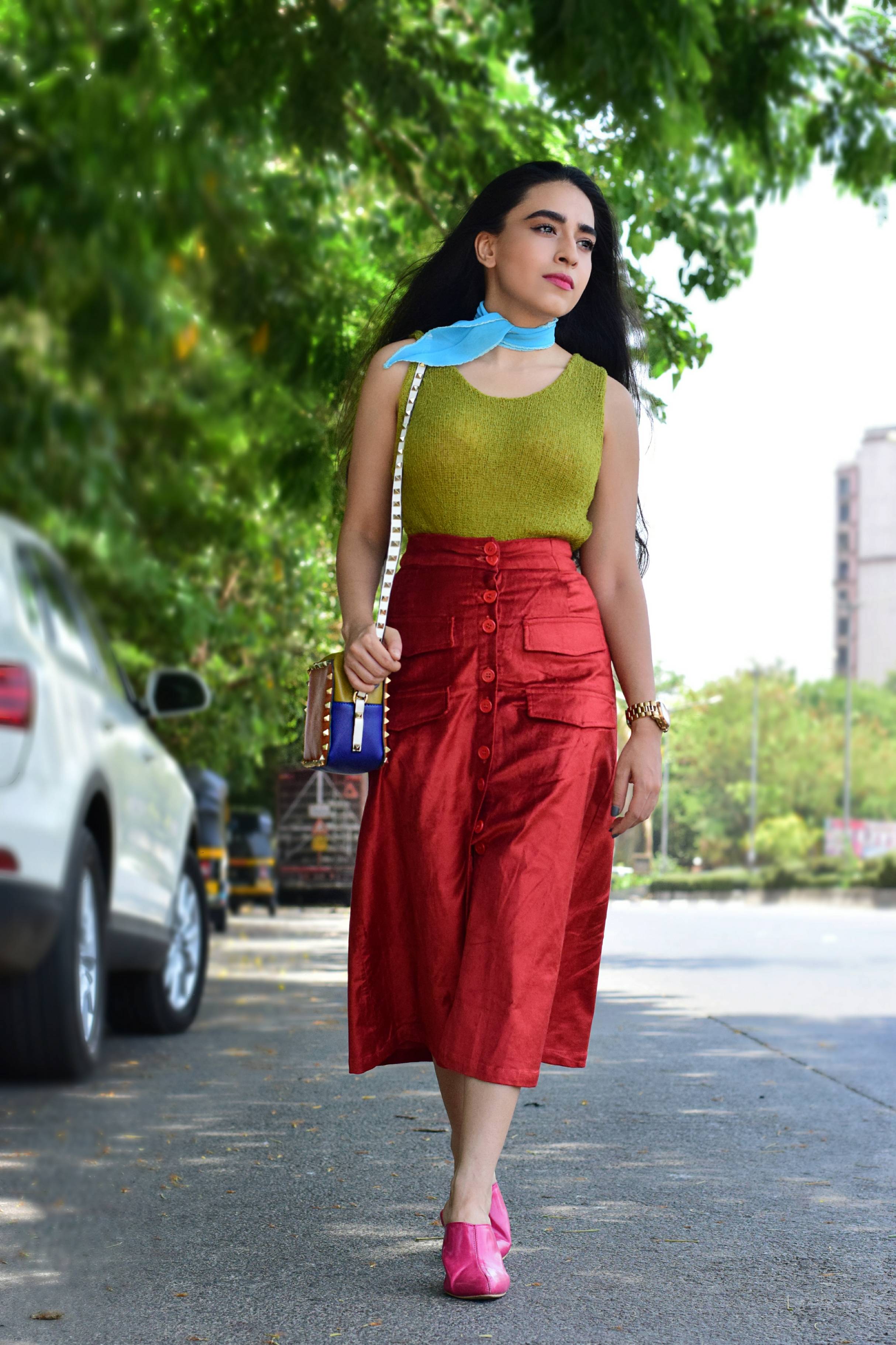 color riot, colorful style, strret style, lakme fashion week, mumbai streets, mumbai street style, fashion week, maroon skirt, skirt style, chartreuse, neck scarf, how to wear a scarf, studded bag, pink mules, mules, colorblocking, outfit, ootd, blogger, fashion blogger