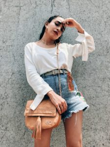 deal jeans, E2O bags, denim shorts, embroidered shorts, jean shorts, floral embroidery, floral shorts, denim cut offs, cut out sweat, cut out blouse, tassel bag, tan sling bag, beige boots, street style, pfw, fashion week, casual look