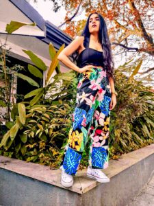 tropical print pants, floral pants colorful ootd black crop top converse beach ootd indian blogger fashion blogger travel blogger fashion week style