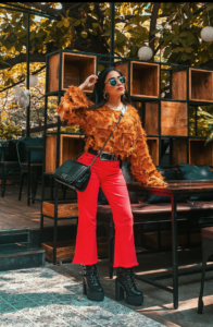 maximalism, oversized, ootd, indian blogger, feather top, shein, romwe, red, boots, red pants, hardcore accessories, black leather accessories, silver hardware, fashion week street style