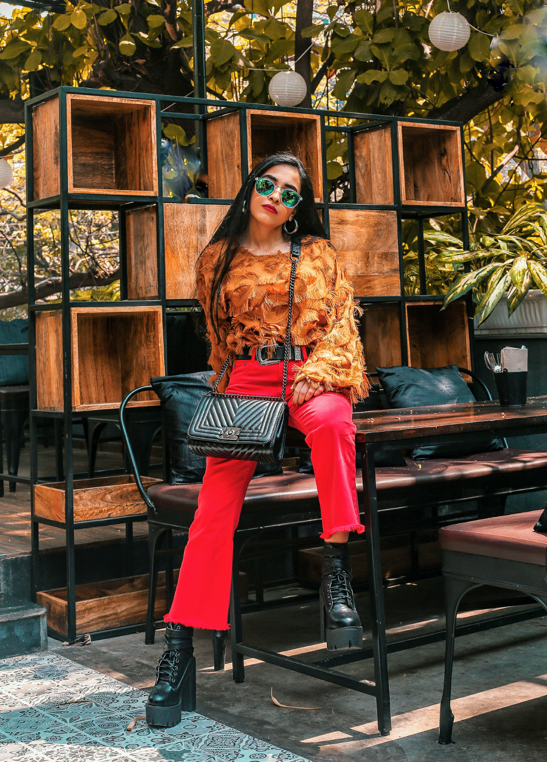 maximalism, oversized, ootd, indian blogger, feather top, shein, romwe, red, boots, red pants, hardcore accessories, black leather accessories, silver hardware, fashion week street style